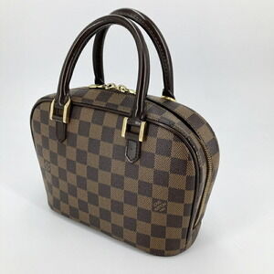 Louis Vuitton Saria Handbag Brown